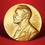 Sisi depan medali Hadiah Nobel untuk Fisika, Kimia, Fisiologi atau Kedokteran, dan Sastra.