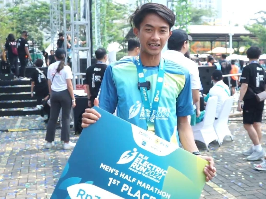 PLN Electric Run 2024: Rayakan Kebersamaan dan Energi Ramah Lingkungan 10 Juara 1 kategori jarak half marathon Pria PLN Electric Run 2024, Robi Syianturi