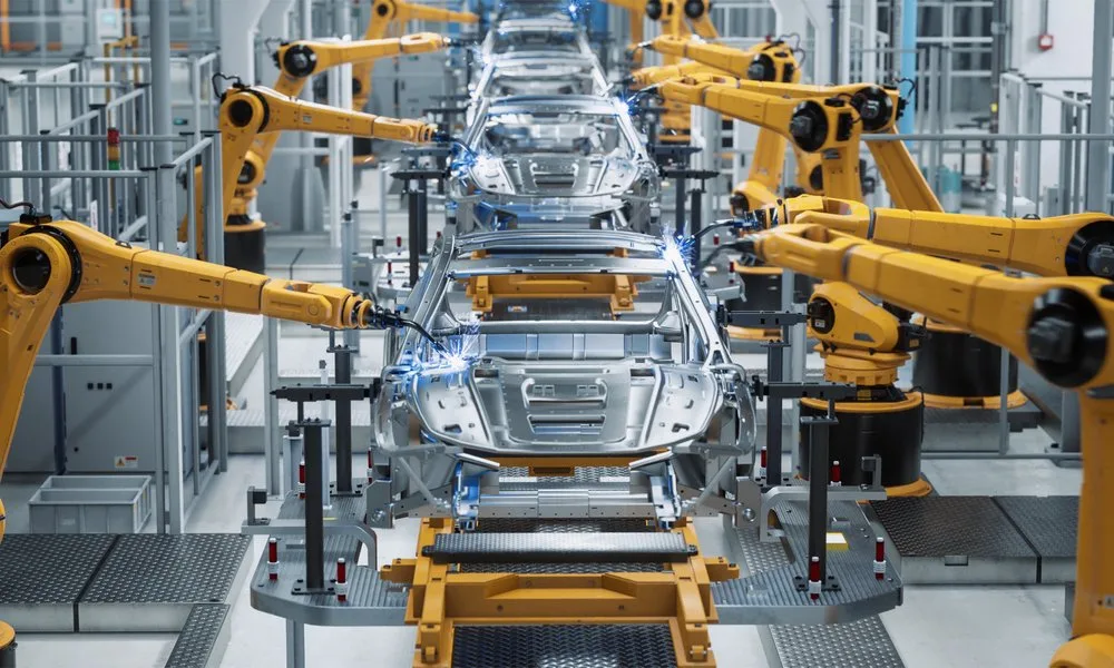 Revolusi Teknologi: Memanfaatkan Peluang dan Menghadapi Tantangan 11 penerapan robot dalam industri otomotif telah meningkatkan produktivitas, namun juga mengakibatkan pemutusan hubungan kerja bagi ribuan pekerja produksi.
